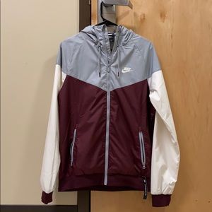 Nike grey/maroon/white windbreaker.